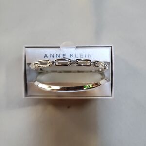 Anne Klein silver tone bangles.